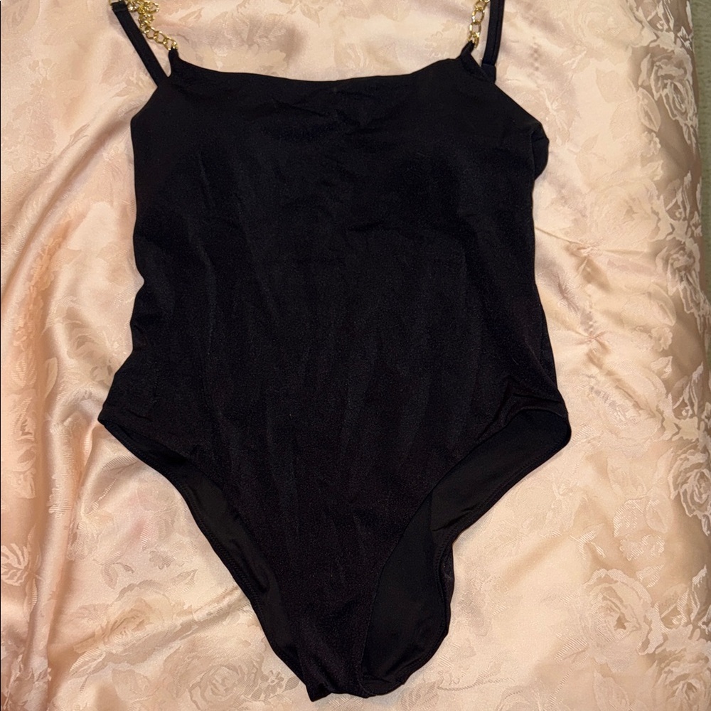 Elegant Black Swimsuit with Gold Accents